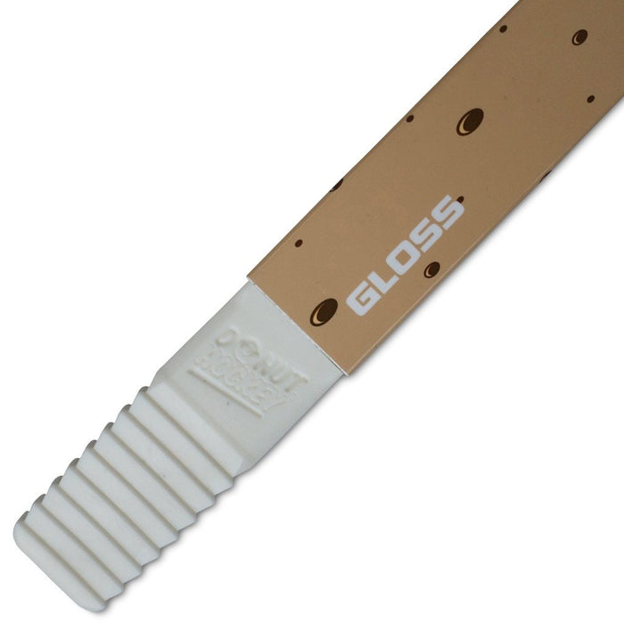 Bâton de hockey sur beignets brillant